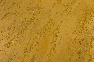 Rough yellow concrete wall surface