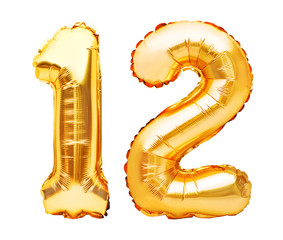 Number 12 twelve made of golden inflatable balloons isolated on white. Helium balloons, gold foil...