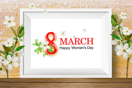 Beautiful greeting card on March 8 with cherry flowers. Congratulations on International Women 's Day