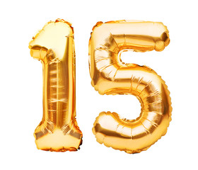 Number 15 fifteen made of golden inflatable balloons isolated on white. Helium balloons, gold foil...