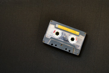 music cassette on old speaker background