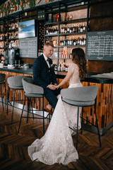 portrait of Gorgeous wedding couple in  cafe