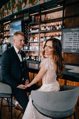 portrait of Gorgeous wedding couple in  cafe