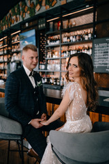 portrait of Gorgeous wedding couple in  cafe