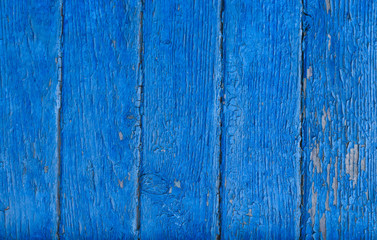 Blue wooden background. Blue faded painted wooden texture, background, wallpaper. Wooden background, painted surface blue boards.  Weathered blue wood background texture. Vertical  planks