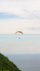 extreme paragliding sports are above the clouds