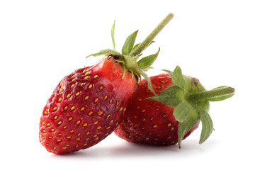 Two strawberries isolated on white