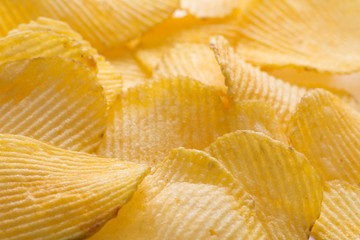 Potato chips background. Close-up photo