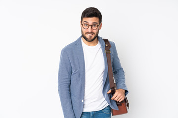 Caucasian business man isolated on white background having doubts and with confuse face expression