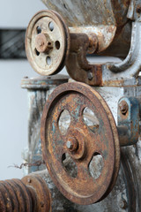 Old rusty machine that is not used in abandoned factory.