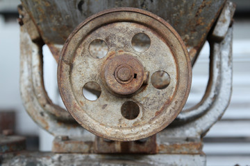 Old rusty machine that is not used in abandoned factory.