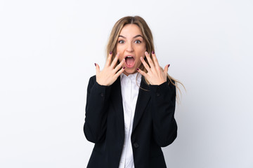 Young business woman over isolated white background with surprise facial expression