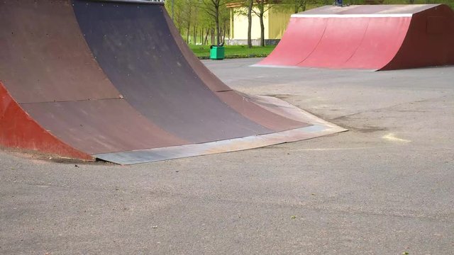 Platform for skateboarding. boys scootering. royalty-free stock footage