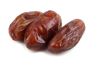 Date fruits isolated on white