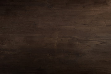 Dark Brown wooden Board background Patterned surface.