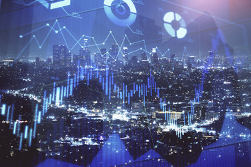 Financial graph on night city scape with tall buildings background multi exposure. Analysis concept.