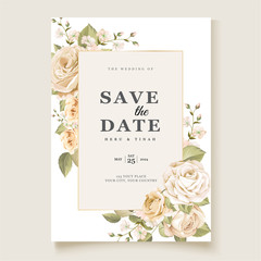 elegant wedding invitation card with floral and leaves