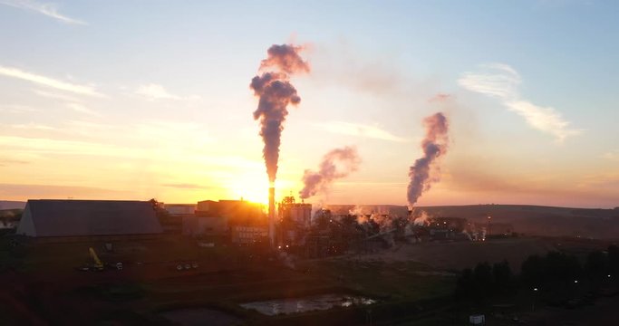 Refinery / Cane Plant. Beautiful aerial image with sunset of the production line of the sugar cane plant - ethanol - Agribusiness.