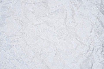 white wrinkled sheet of paper