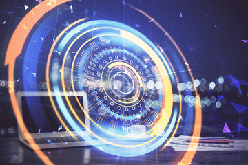 Computer on desktop in office with technology theme hologram. Multi exposure. Tech concept.