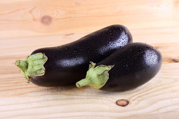 Aubergines on table