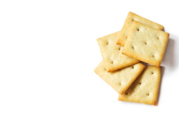 Crispy salty cracker on a white background. Food photo, mockup