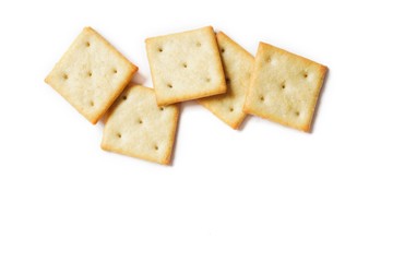 Crispy salty cracker on a white background. Mockup, free space for text