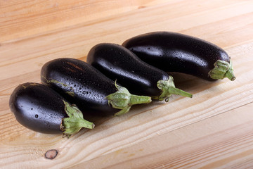 Aubergines on table