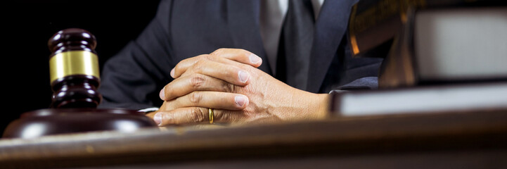 Lawyer or judge consult meeting with client at a law firm about legal legislation in courtroom with...