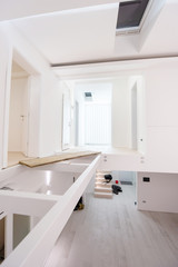 Fototapeta na wymiar Interior of empty stylish modern open space two level apartment