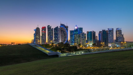 Fototapeta na wymiar The high-rise district of Doha day to night timelapse after sunset