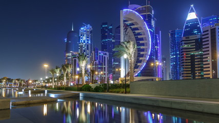 The skyline of Doha by night with starry sky seen from Park timelapse, Qatar