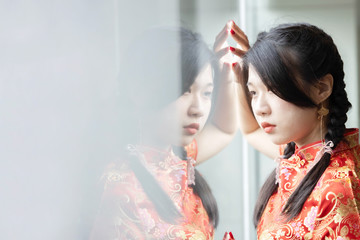 Portrait Asian Woman in Cheongsam For Chinese New Year Celebration