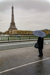 eiffel tower under the rain