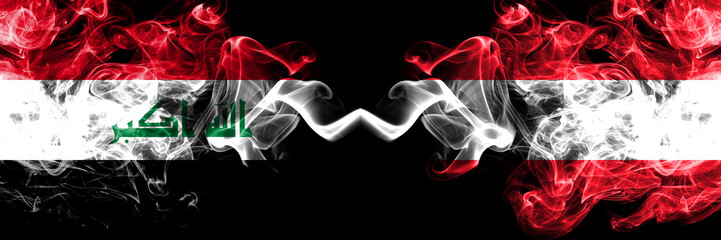 Iraq, Iraqi vs Austria, Austrian smoky mystic flags placed side by side. Thick colored silky smokes...