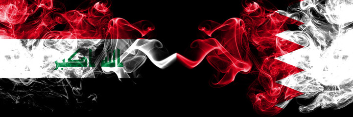 Iraq, Iraqi vs Bahrain, Bahrani smoky mystic flags placed side by side. Thick colored silky smokes flags together.