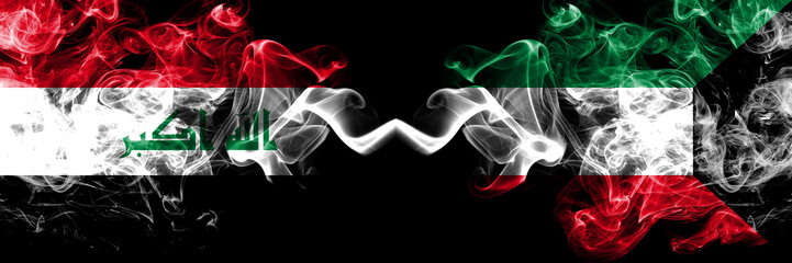 Iraq, Iraqi vs Kuwait, Kuwaiti smoky mystic flags placed side by side. Thick colored silky smokes flags together.