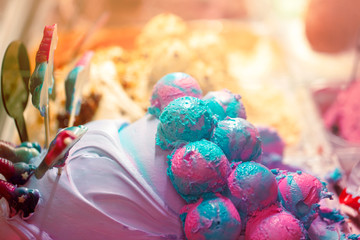 Colorful ice-cream on display in candy shop