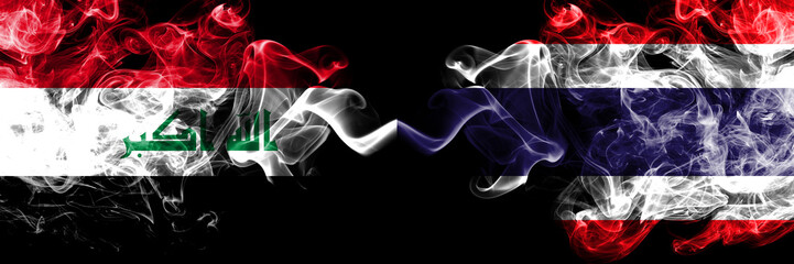Iraq, Iraqi vs Thailand, Thai smoky mystic flags placed side by side. Thick colored silky smokes flags together.
