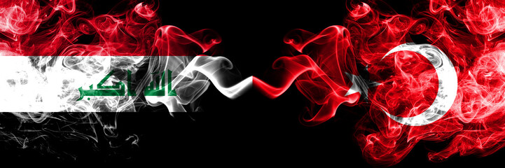 Iraq, Iraqi vs Turkey, Turkish smoky mystic flags placed side by side. Thick colored silky smokes flags together.