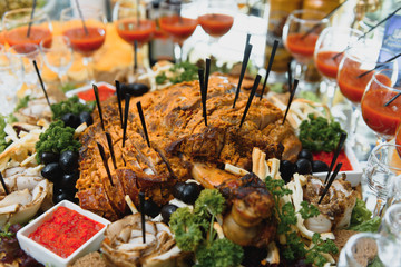 Meat and cheese appetizers. Antipasti and catering platter with different meat and cheese products.