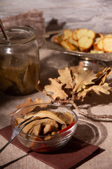 Homemade pickled forest mushrooms on the table