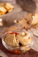Homemade pickled forest mushrooms on the table