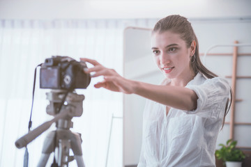 Women broadcast their clothing sales live online.