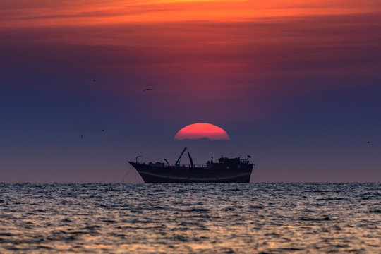 sunset over the sea photo taken from Oman salalah