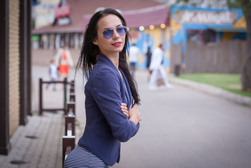 Striped dress, sunglasses, blazer, city