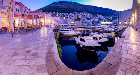 Fototapeta na wymiar View of the old harbor and the city Dubrovnik in the morning.