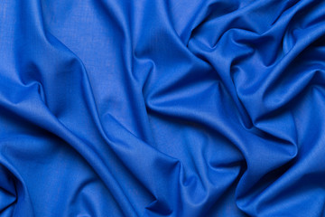 Blue fabric cloth texture. abstract texture background with soft waves.