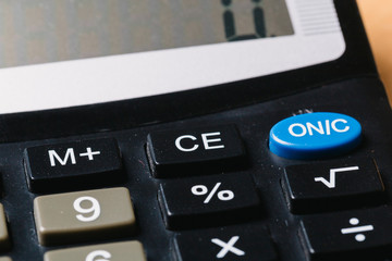 Obraz premium Modern calculator, Business and Finance accounting concept on wooden table