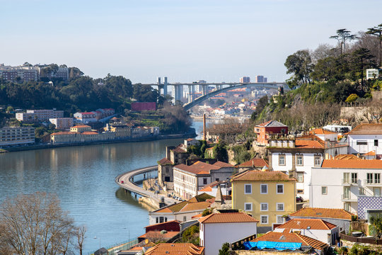 Panoramic photo of the city of Porto from Jardim das Virtudes in the center of Porto. Arr&aacute;bida bridge in the background and Douro River.